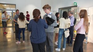 Meta-Active researchers discuss science during a coffee break