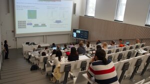 The audience listens to a project presentation during Meta-Active Annual Meeting 2022